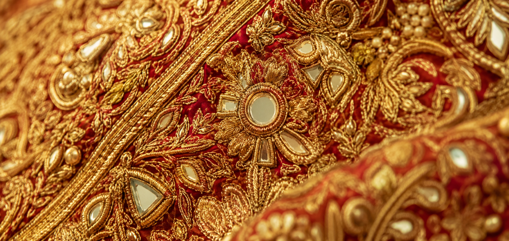Intricate vintage details and embroidery on an upcycled sustainable bridal lehenga